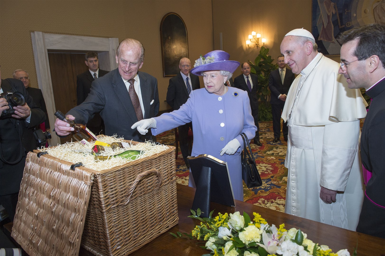 The Pope met Queen Elizabeth II and the Duke of Edinburgh in 2014 during their visit to the Vatican (PA)