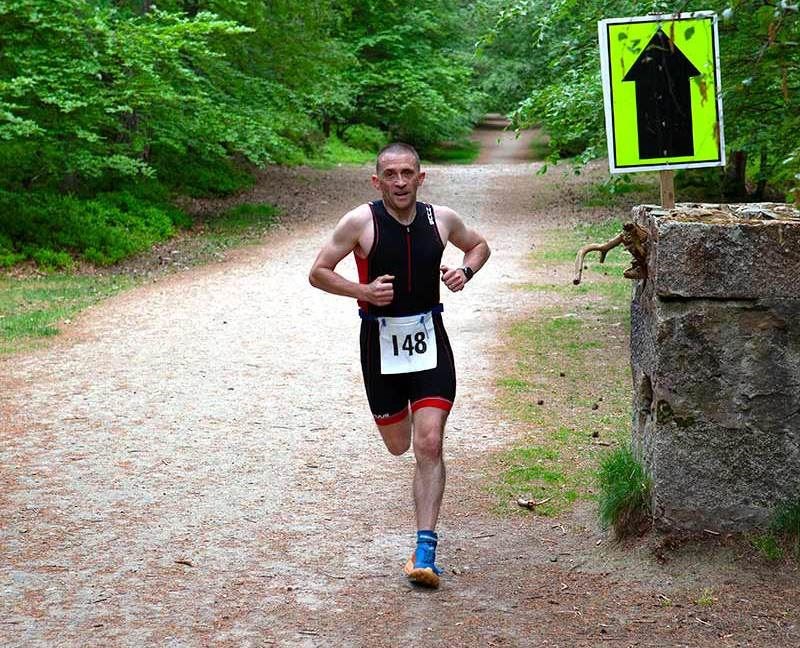 Martin Munro gets into his stride on the run.