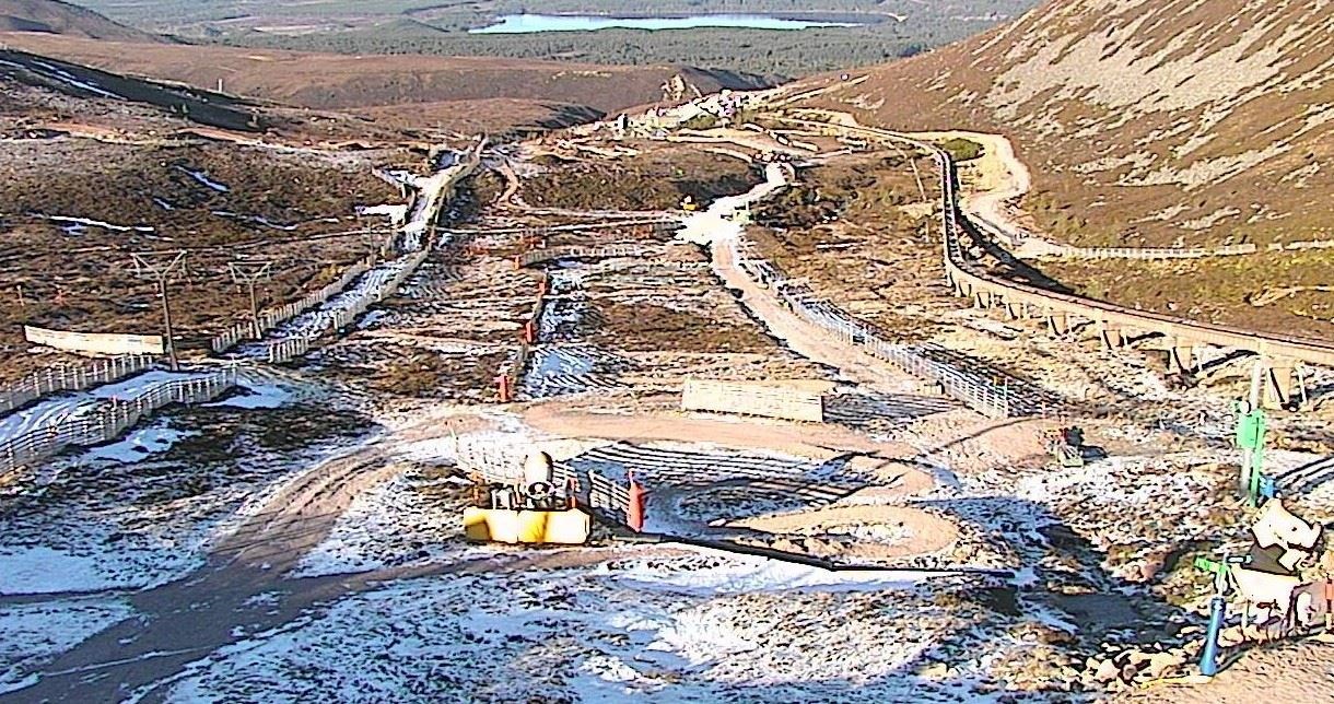The bare: a shot this morning from the Sunkid webcam shows where what's left of the snow begins, with the best of what's available up towards the Ptarmigan.