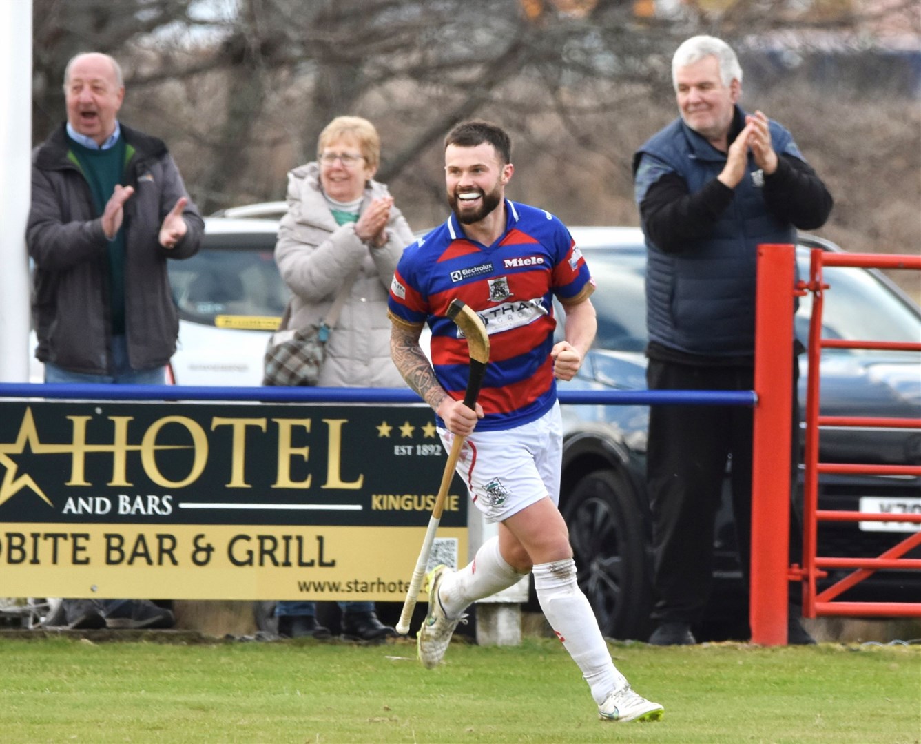 Skipper Thomas Borthwick is all smiles during Kingussie's win over Skye on Saturday. Picture: Fiona Young.