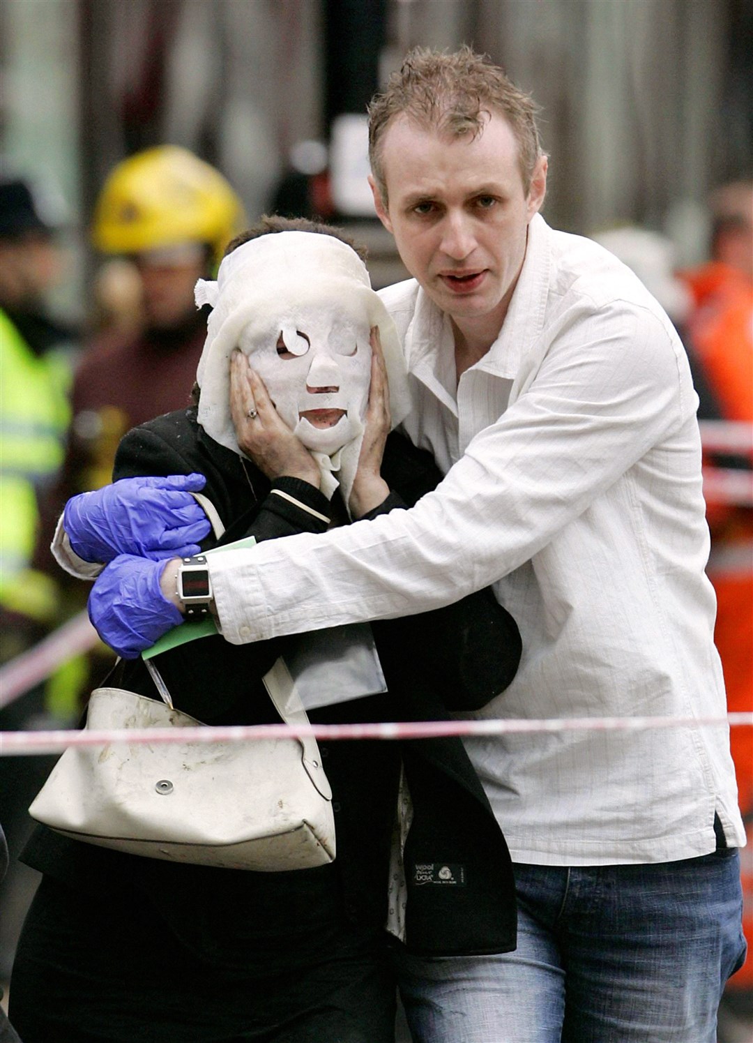Walking wounded leaving Edgware Road tube station after the July 7 attacks in 2005 (Edmond Terakopian/PA)