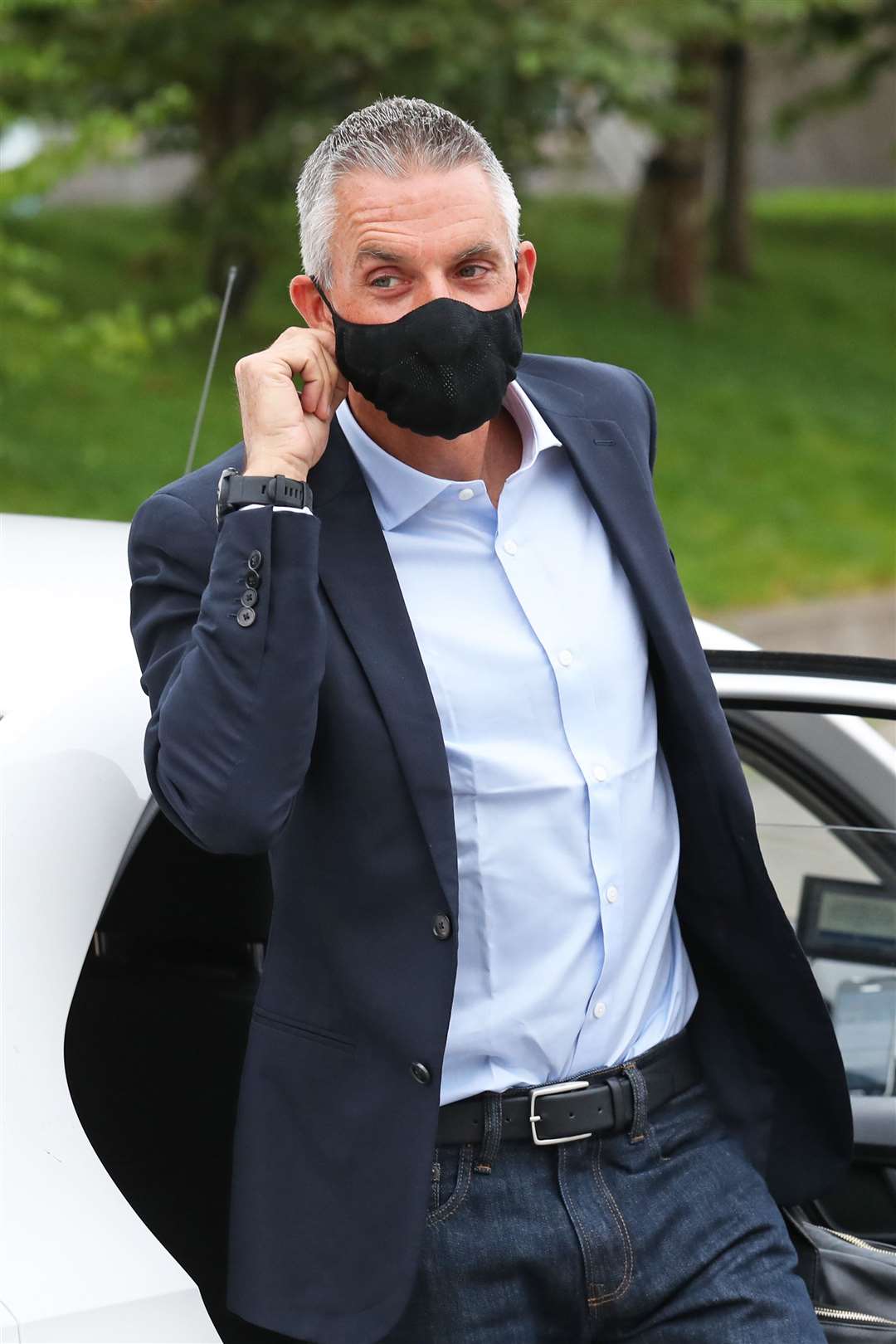 He took off his mask as he got out of the car (Andrew Milligan/PA)