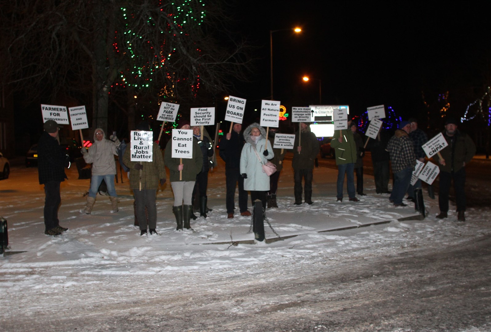 Making their point: farmers and friends outside the Cairngorms National Park Authority office in Grantown this evening