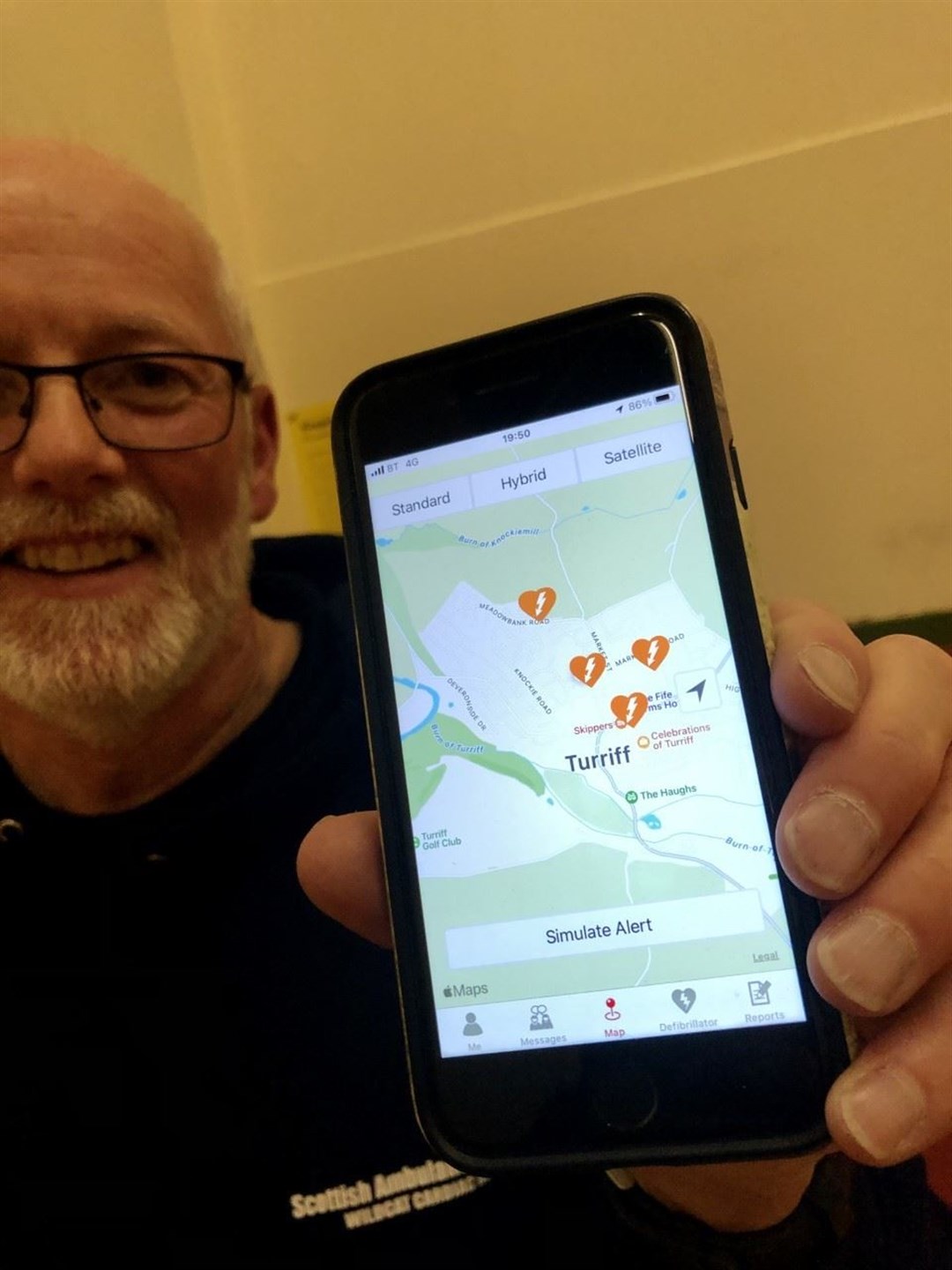 Ian Hendry with the GoodSam app which has been rolled out across Scotland.