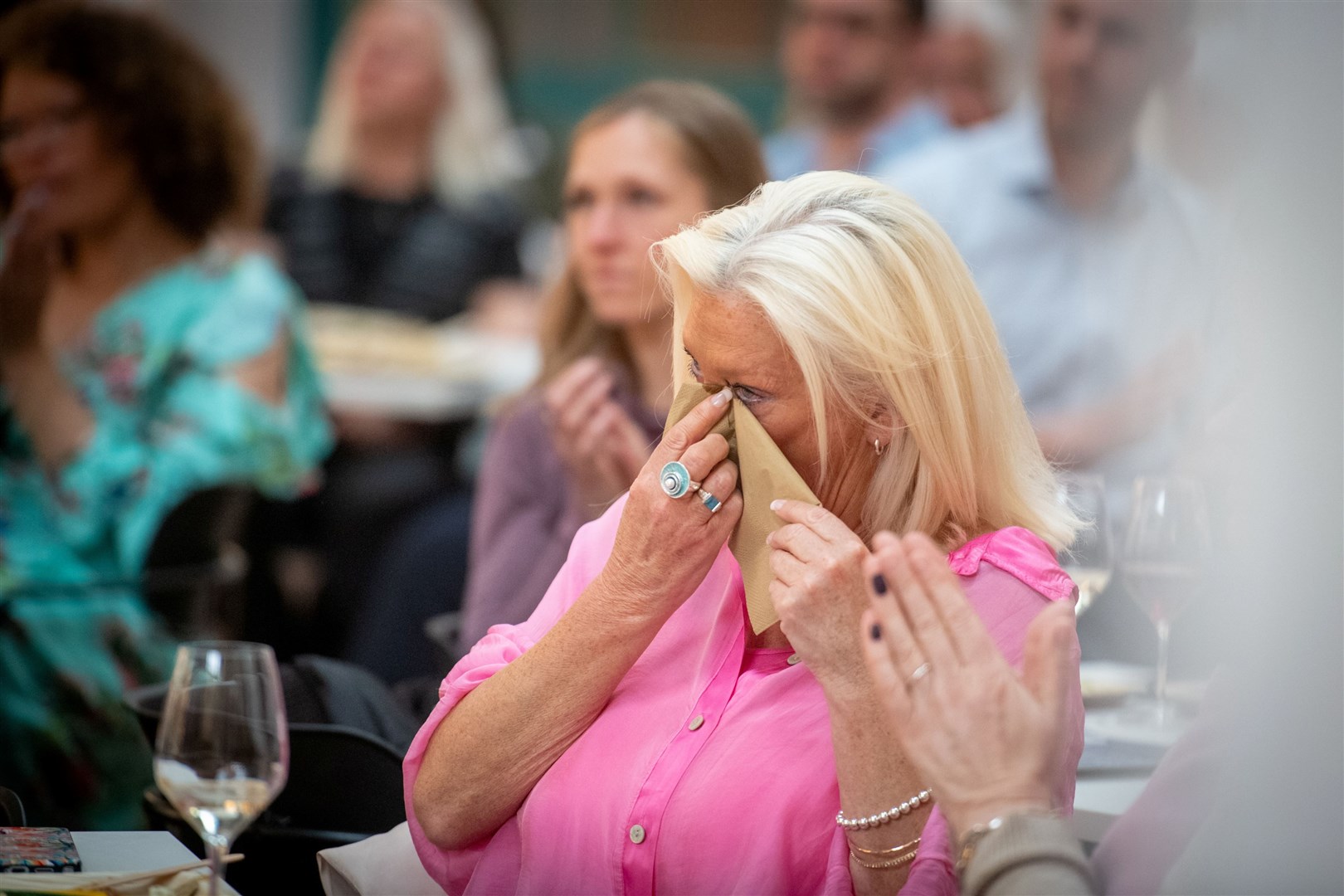 Angela Wilson, hearing some of the emotional personal stories. Picture: Callum Mackay.