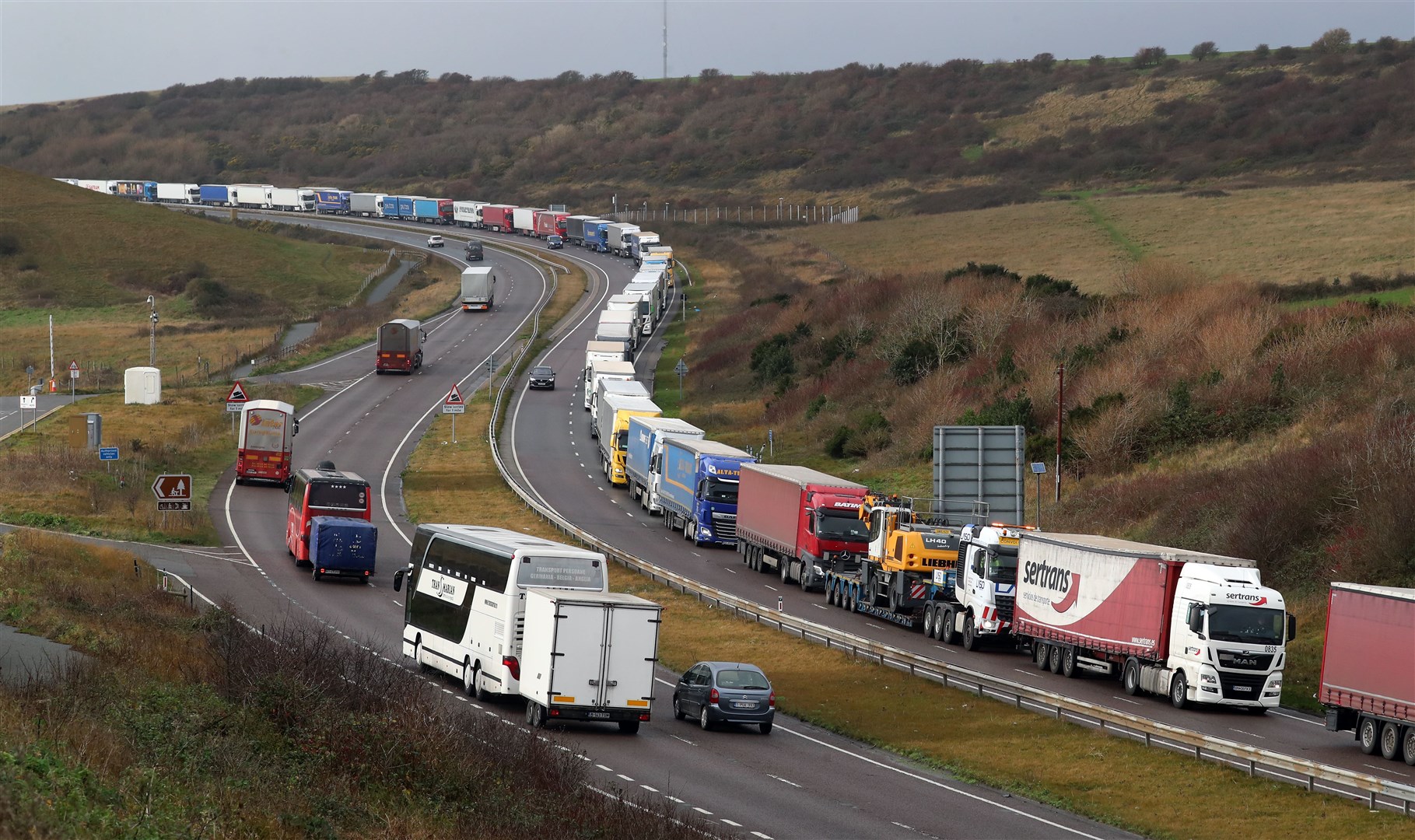 Lorries queue on the A20 (Gareth Fuller/PA)