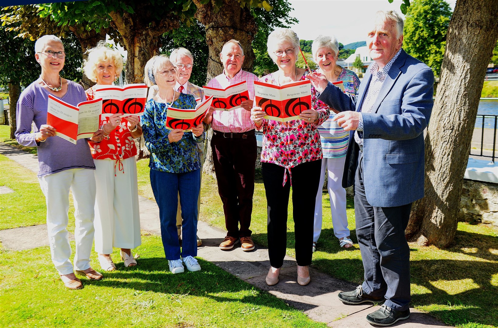 John Crombie (right), with Nurses Choir committee members, from left, Gill Silver, Auriol Downie ,Valery Dean, Archie Drummond, Frank Stephen, Heather MacLean and Sheila Bruce.