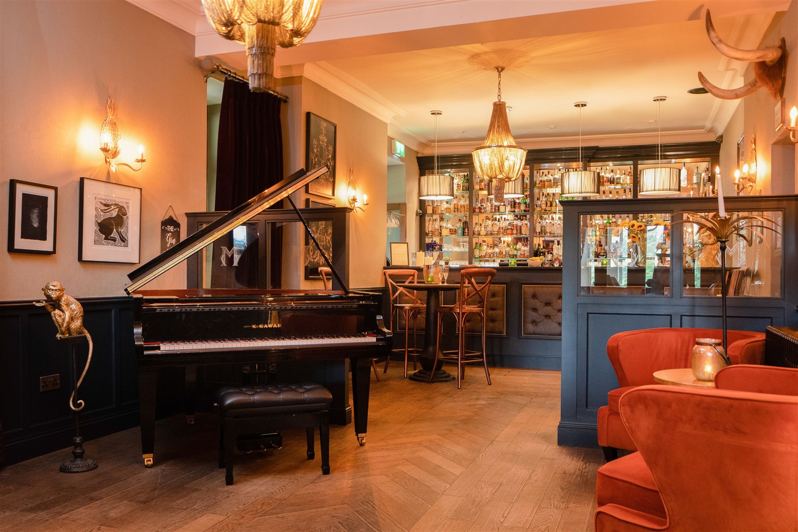 GRAND STYLE: The dining room comes complete with grand piano