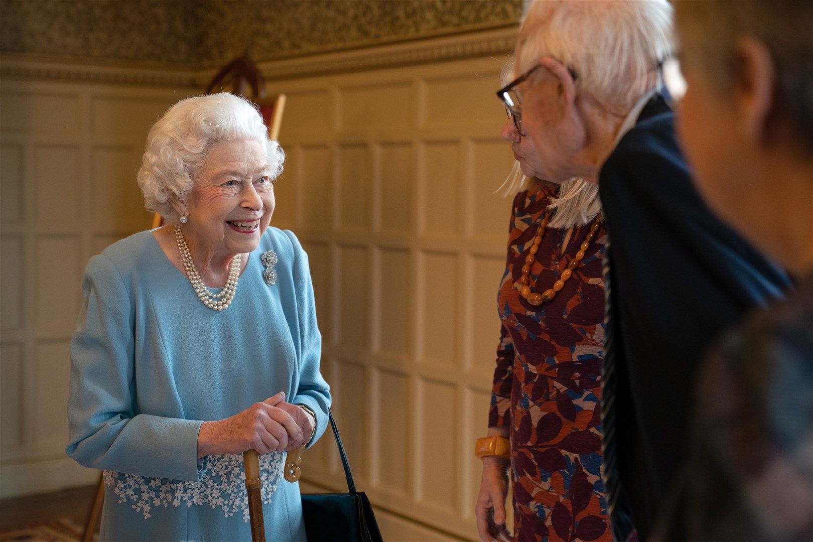 Although her schedule was not quite as busy as it once was, the Queen continued to have an active public life as she prepared to celebrate her Platinum Jubilee. Here, she meets members of the West Norfolk Befriending Society at Sandringham in February (Joe Giddens/PA)