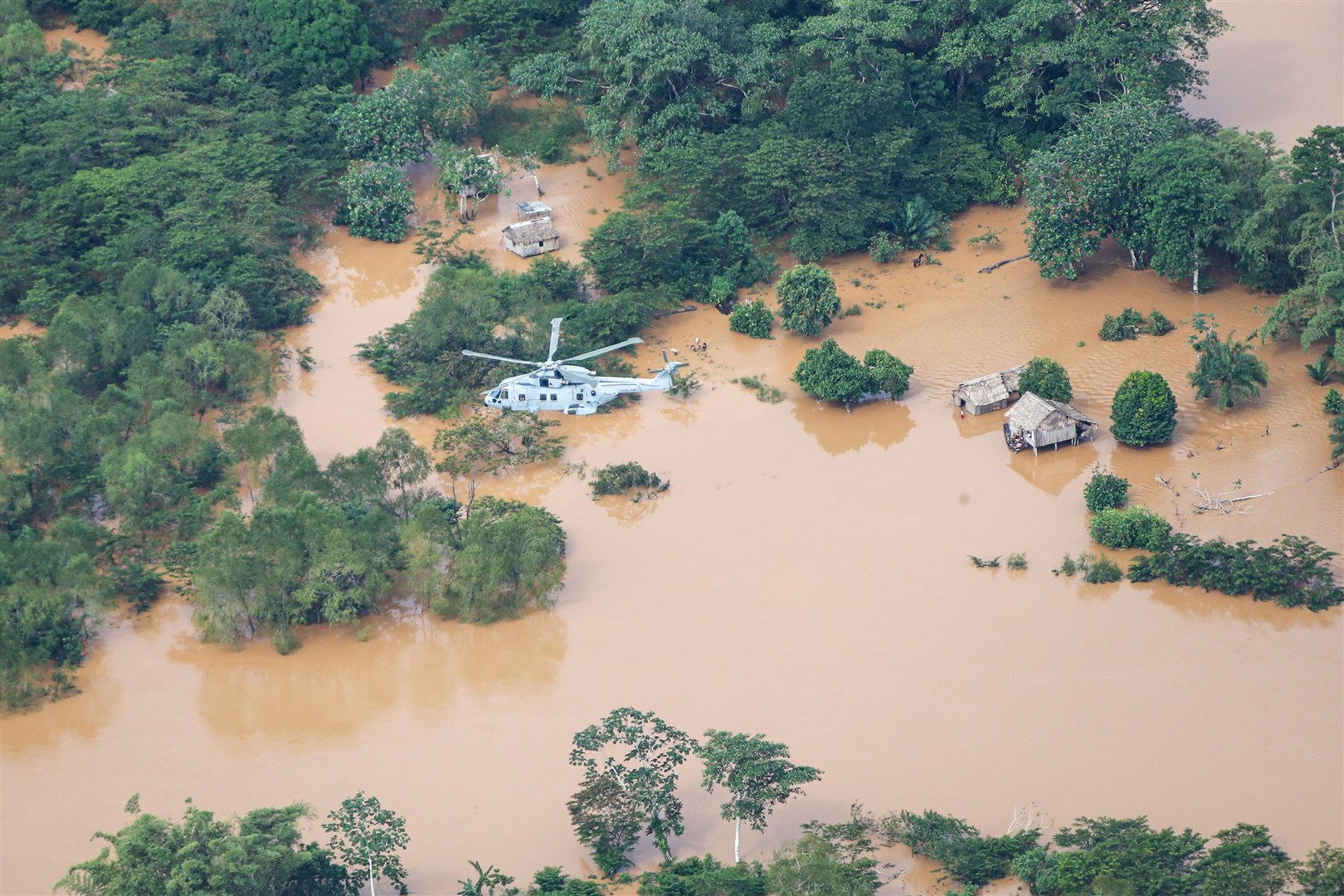 A Merlin Helicopter from 845 Naval Air Squadron conducting damage surveys in Honduras (LPhot Robert Oates/PA)
