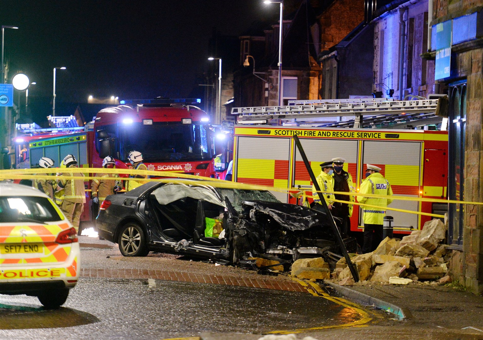 RTC on Grant Street as car hits former William Hill on junction with Lochalsh Road..Picture HN&M staff..