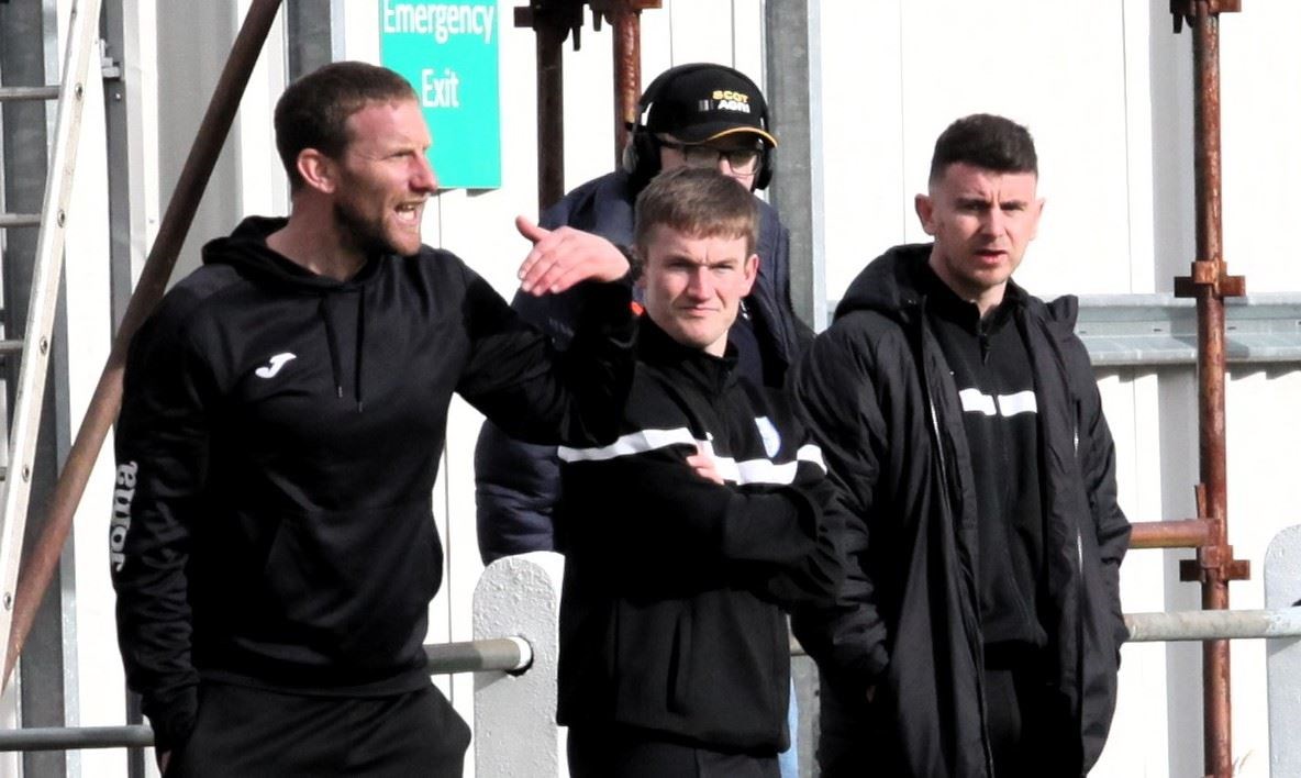 Ryan Esson with assistants Don Johnstone and Aaron Donnan on the touchline at Seafield Park.