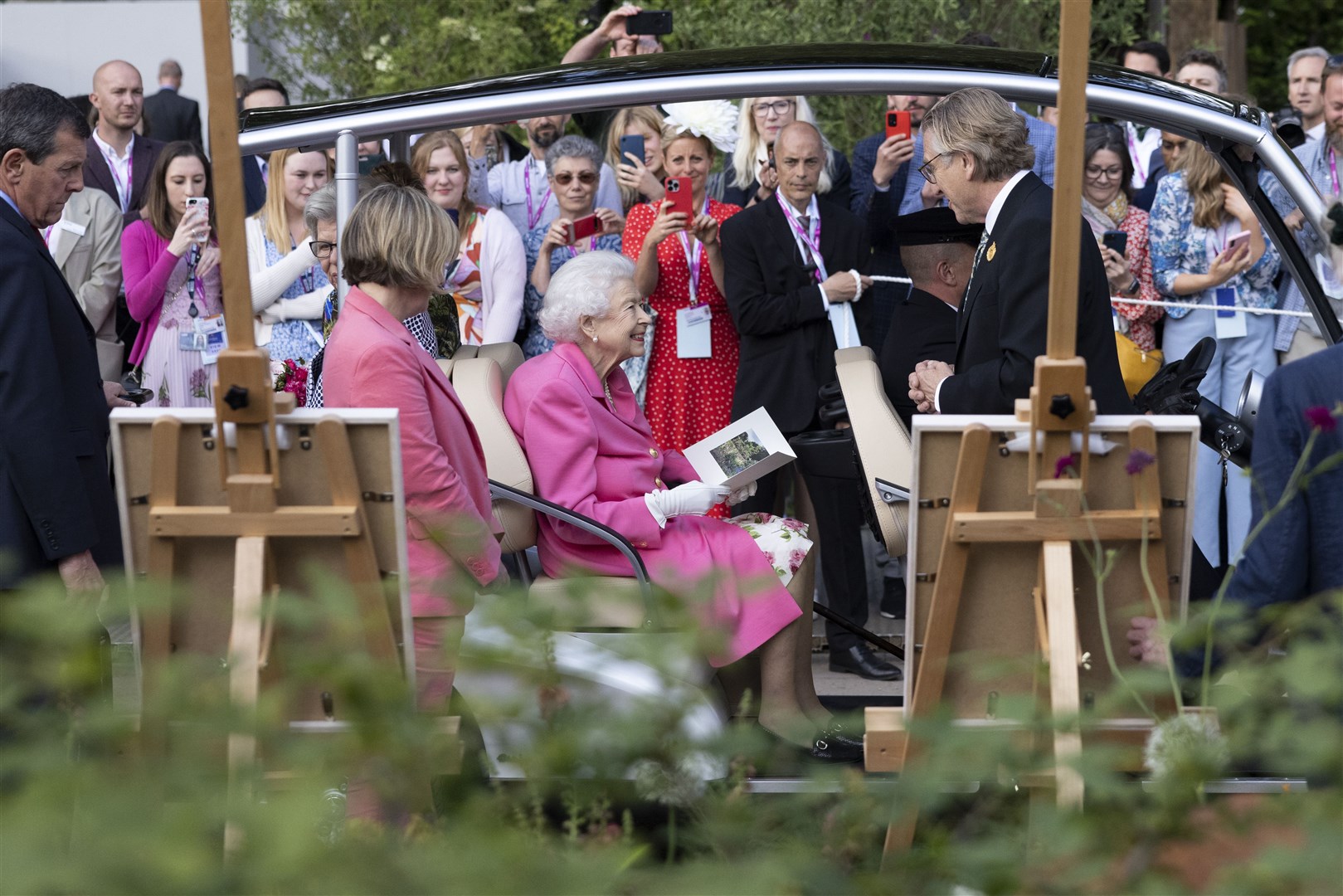 The Queen, sitting in a buggy, on a tour of the Chelsea Flower Show (Dan Kitwood/PA)