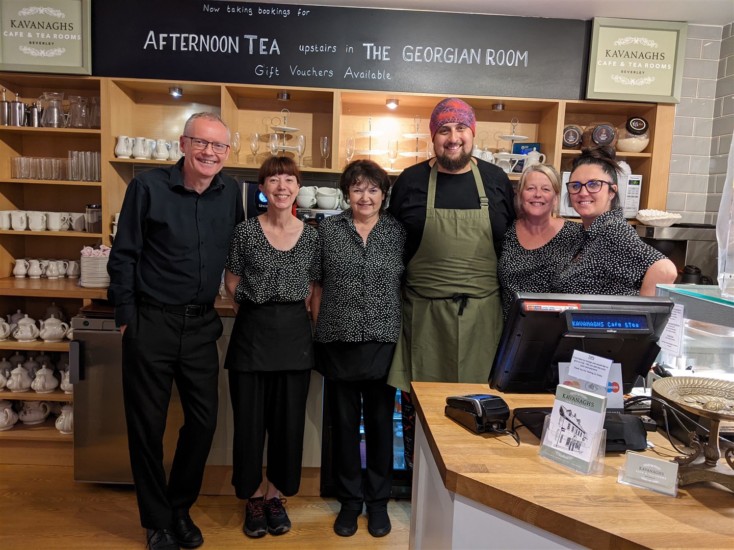 Robert Chapman (far left), alongside Kavanagh’s cafe and tea rooms colleagues Cath Green, Heather Morgan, Ricky Boreham, Kat Simpson, Gemma Wilde (Robert Chapman/PA)