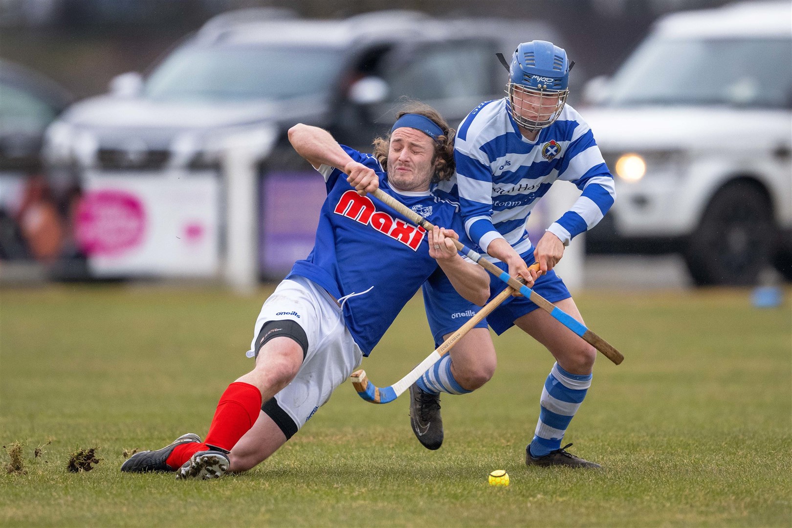 Kyles' Andrew King with Charlie Ferguson (Newtonmore). Newtonmore v Kyles Athletic in the Mowi Premiership, played at The Eilan, Newtonmore.