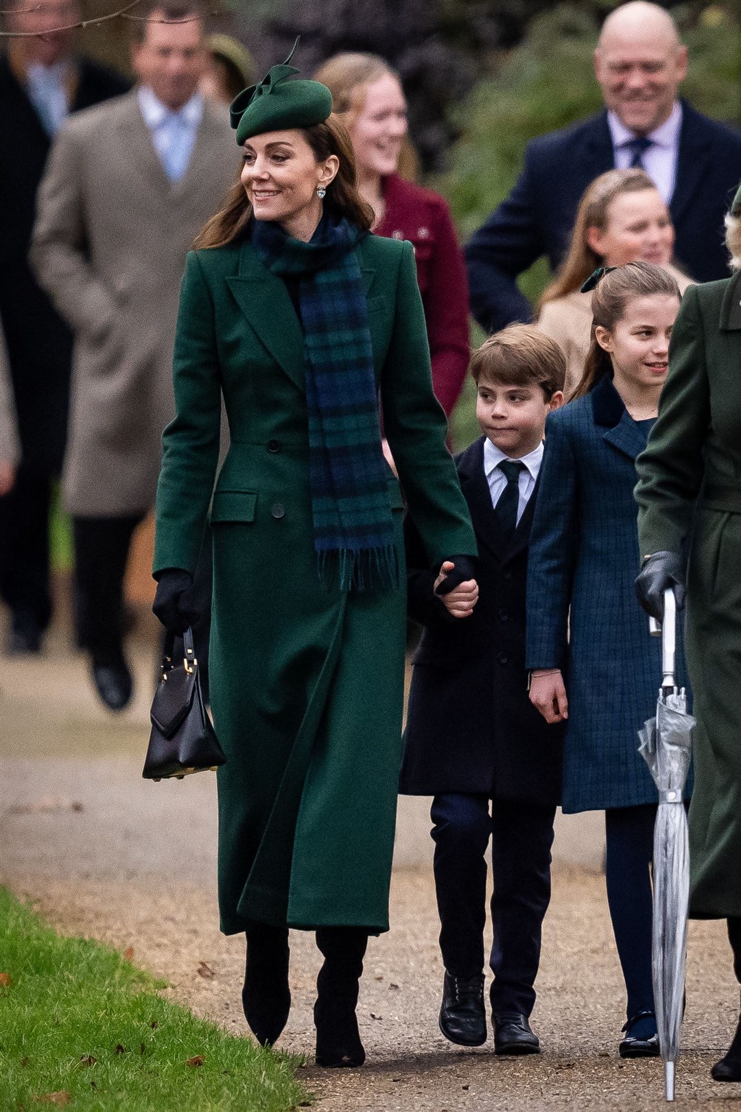 The Princess of Wales holding hands with Prince Louis as they attended the Christmas Day morning church service in December 2024 (Aaron Chown/PA)