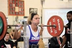 Lynda Banks from Grantown, overall winner at the Scottish Masters Powerlifting Championships, does a squat.