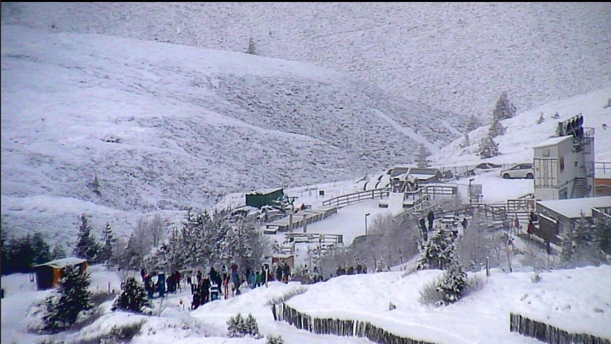 Some of the New Year visitors by the Day Lodge and Coire Cas car park. Picture: Cairngorm Mountain webcam.