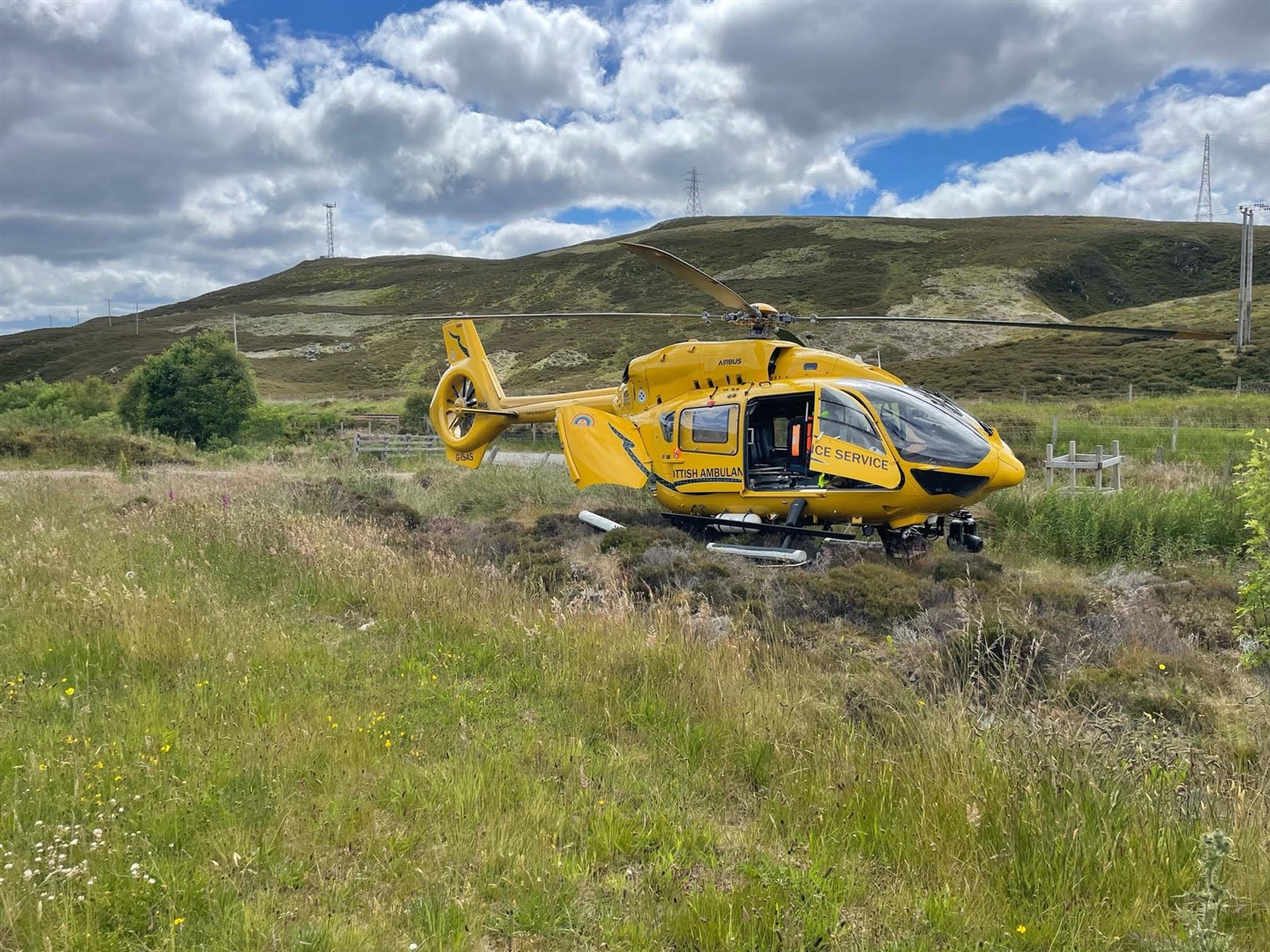 A Scottish air ambulance waits to take off once the paramedics have treated the casualties