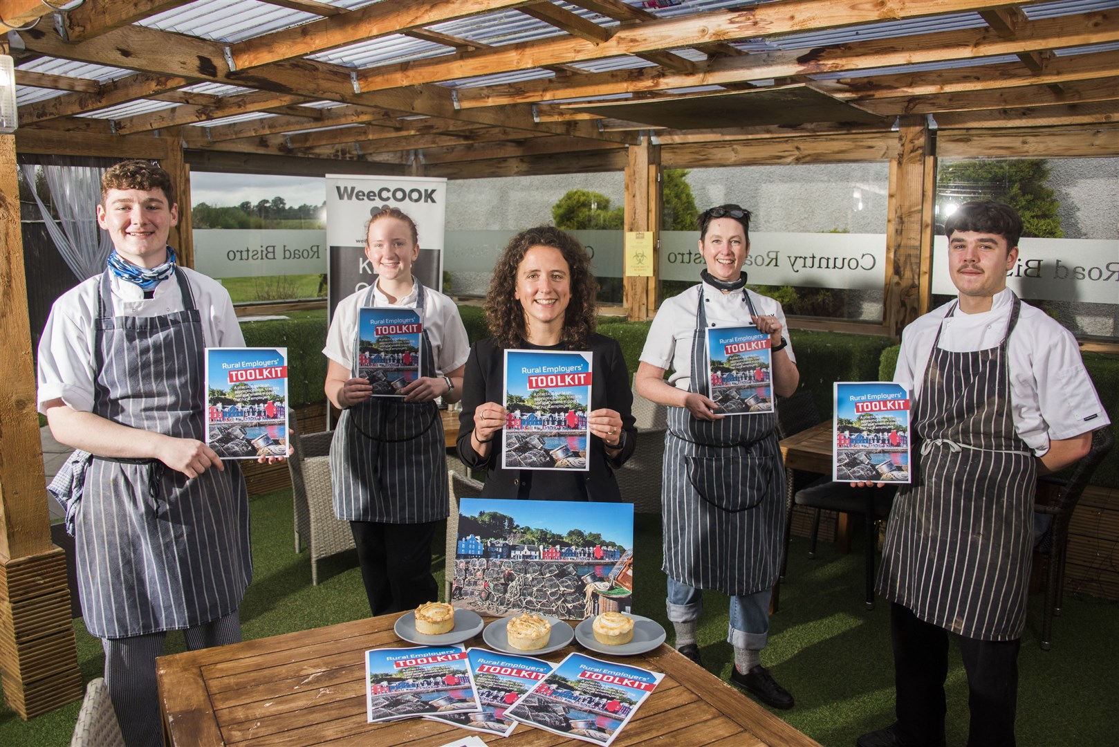 MSP and cabinet secretary for rural affairs and islands Mairi Gougeon (centre) with (left to right) apprentices Paul Curran and Anya Sturrock, WeeCook chef/owner Hayley Wilkes and apprentice Ethan O'Hare.