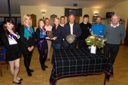 Hannah Mclean (left of centre), winner of the ladies’ handicap trophy at Wick Golf Club’s annual gala week competition, receives her prize from Gala Queen Catherine-Anne Crawford. The ladies’ scratch award went to Marion Mackay, while the men’s handicap w