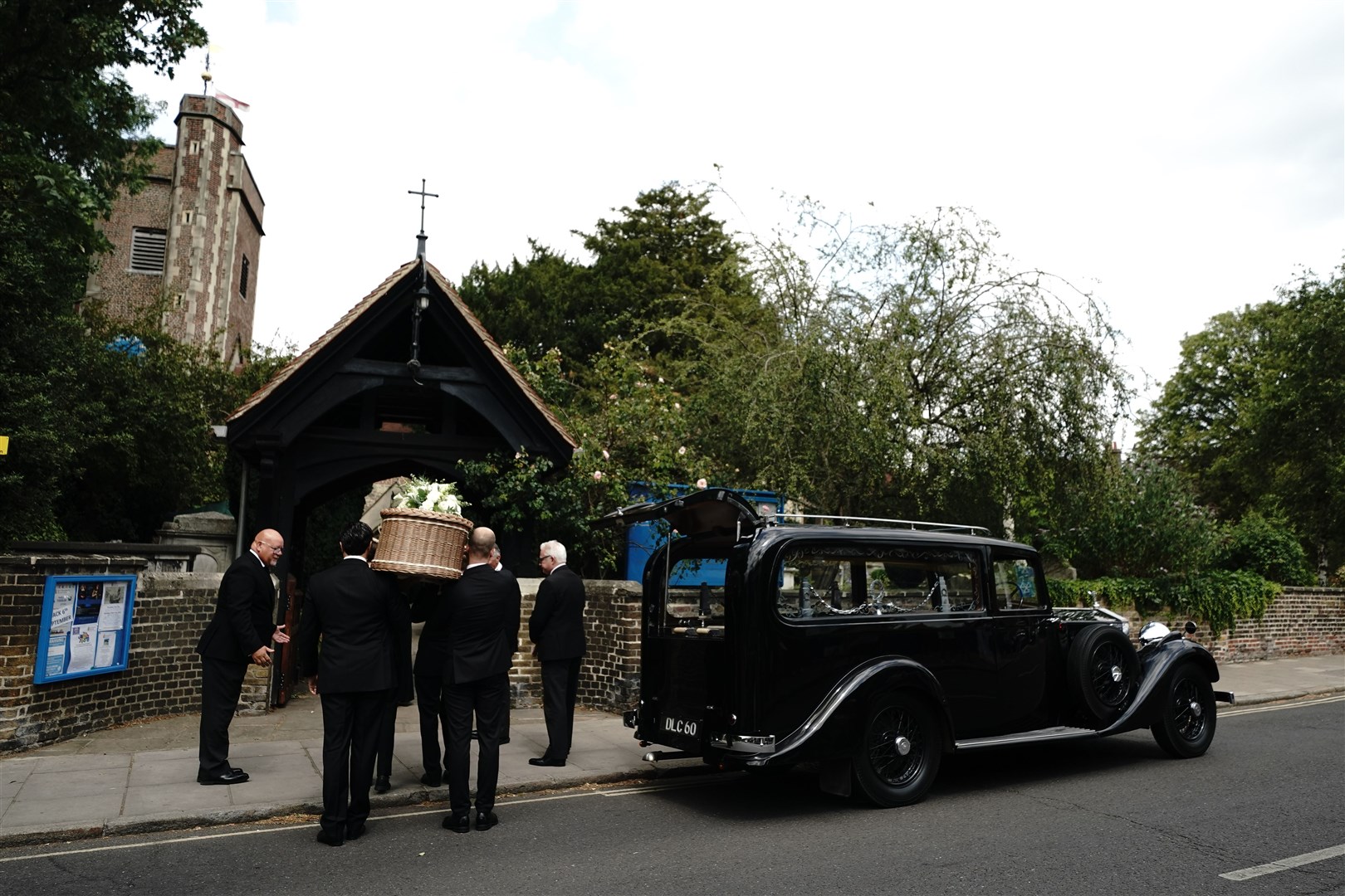 Pallbearers carry the coffin of Dame Deborah James (Aaron Chown/PA)