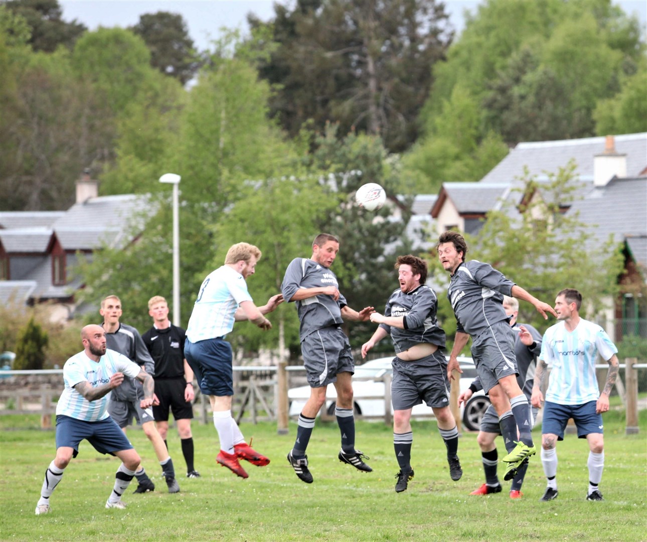 New boys FC Abernethy clear the danger from an Aviemore Thistle attack.