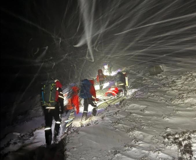 Mountain rescue team members had to battle blizzard conditions to guide the walkers to safety from the famous mountain pass overnight. Picture: Braemar Mountain Rescue Team.