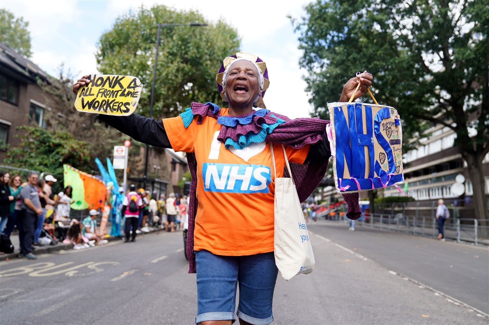 An NHS supporter was among those at the carnival (James Manning/PA)