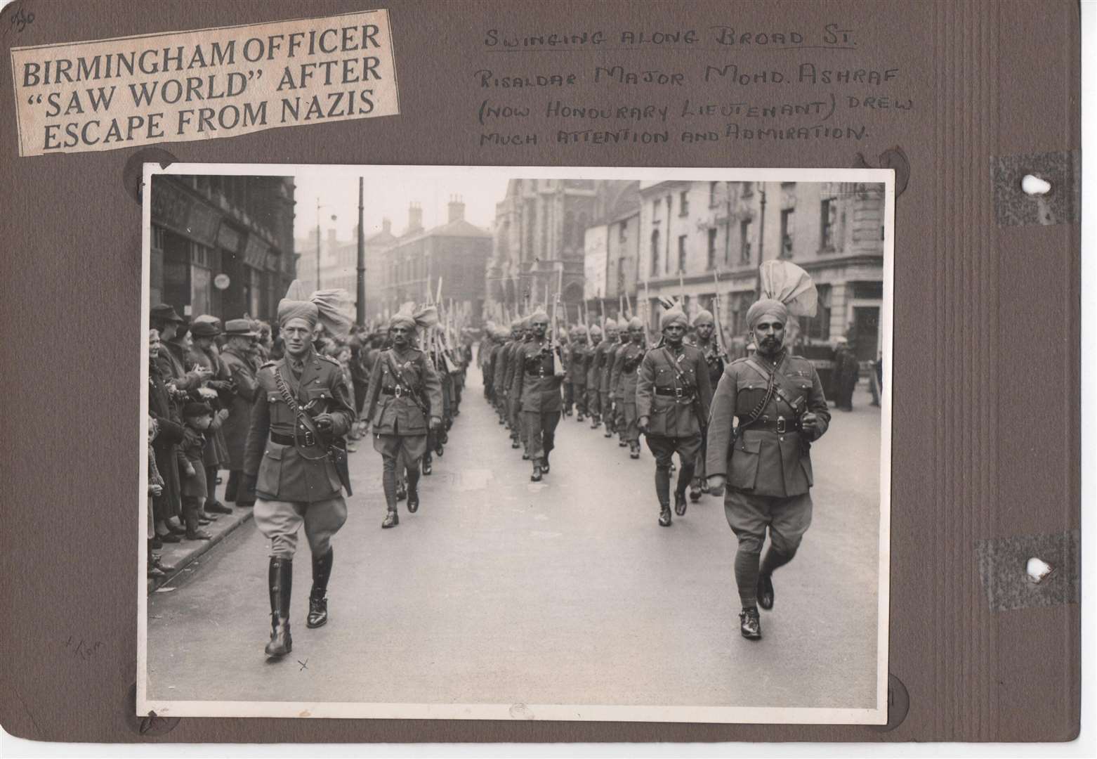 Lieut Thomas Hexley marching with the Indian Contingent through the streets of Birmingham in 1941.