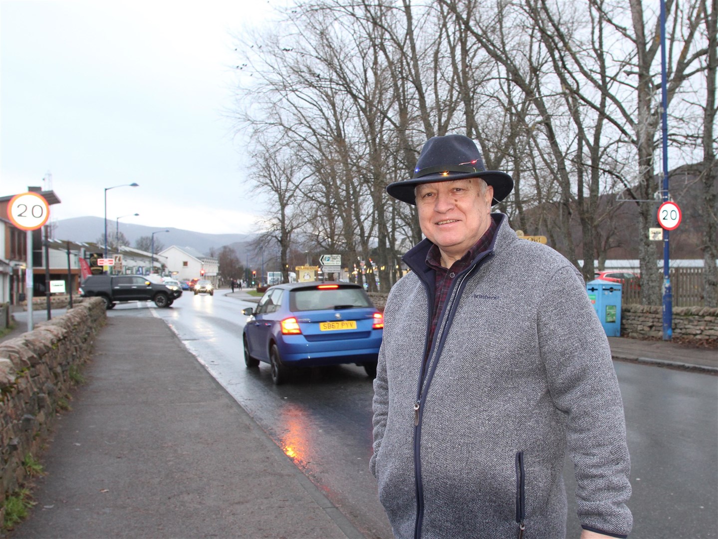 Councillor Bill Lobban by some of the new 20mph signs which were erected in Aviemore at the weekend and came into force early Monday morning.