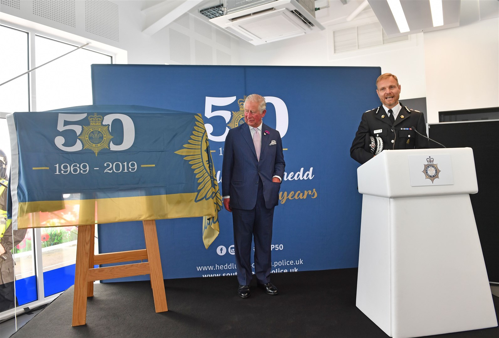 The Prince of Wales is introduced by chief constable Matt Jukes during a visit to the South Wales Police headquarters to celebrate their 50th anniversary in 2019 (Jacob King/PA)