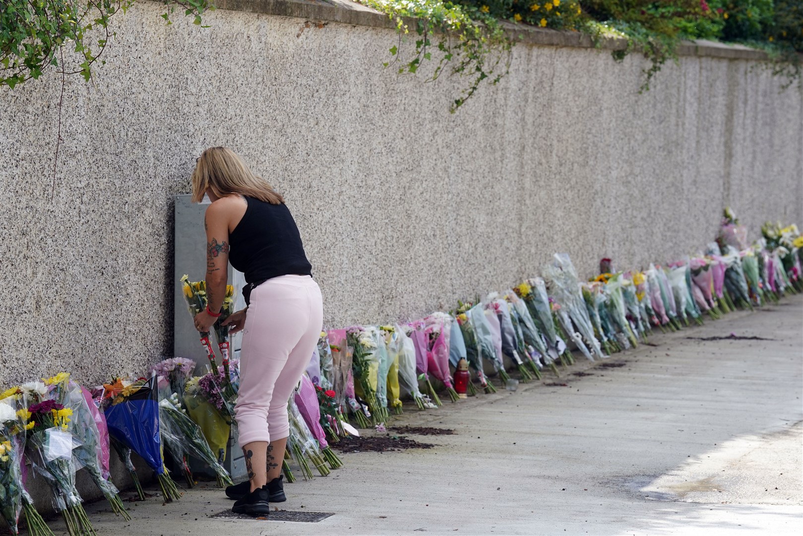 Flowers and tributes left near to the scene of the crash (Brian Lawless/PA)