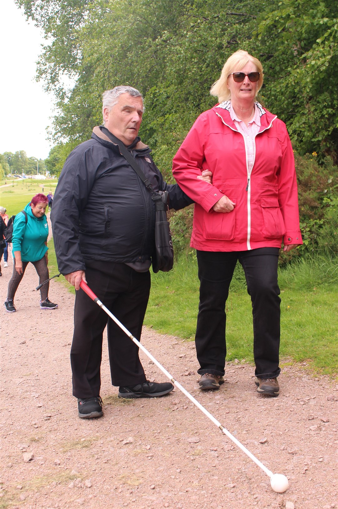 Evan Macdonald and his support worker Ann McCorquodale on the path at Torvean Park.