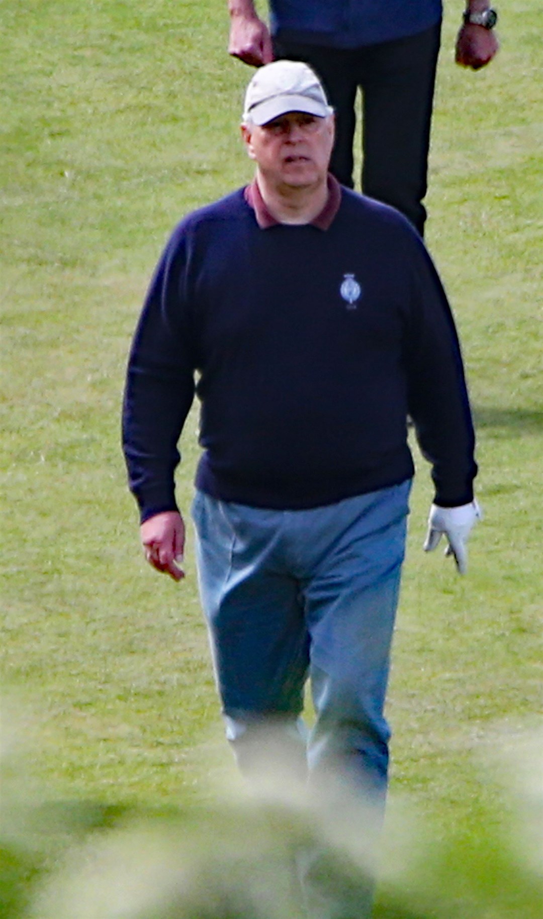 Prince Andrew looking relaxed while golfing at Castle Stuart.