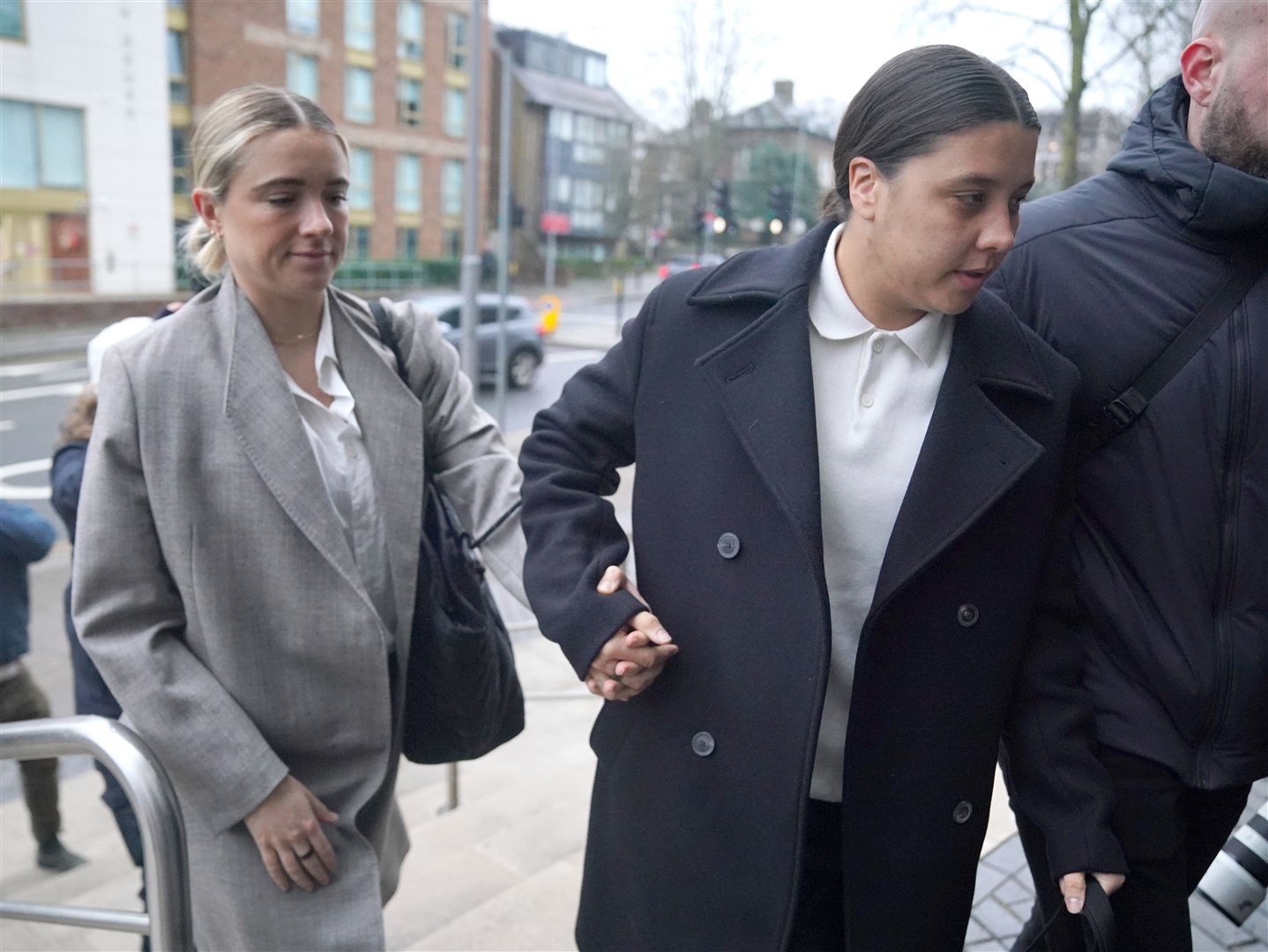 Chelsea and Australia striker Sam Kerr arrives wither partner Kristie Mewis at Kingston Crown Court (Jonathan Brady/PA)