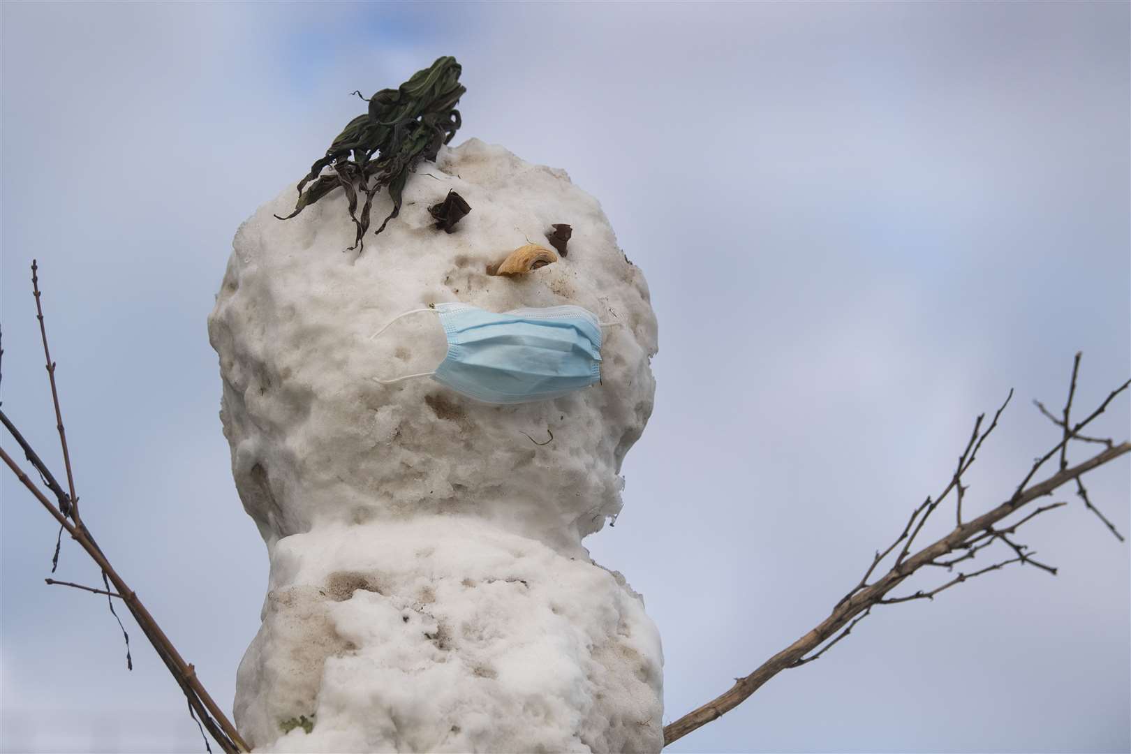 A snowman wearing a mask in Southend on February 12 (Victoria Jones/PA)