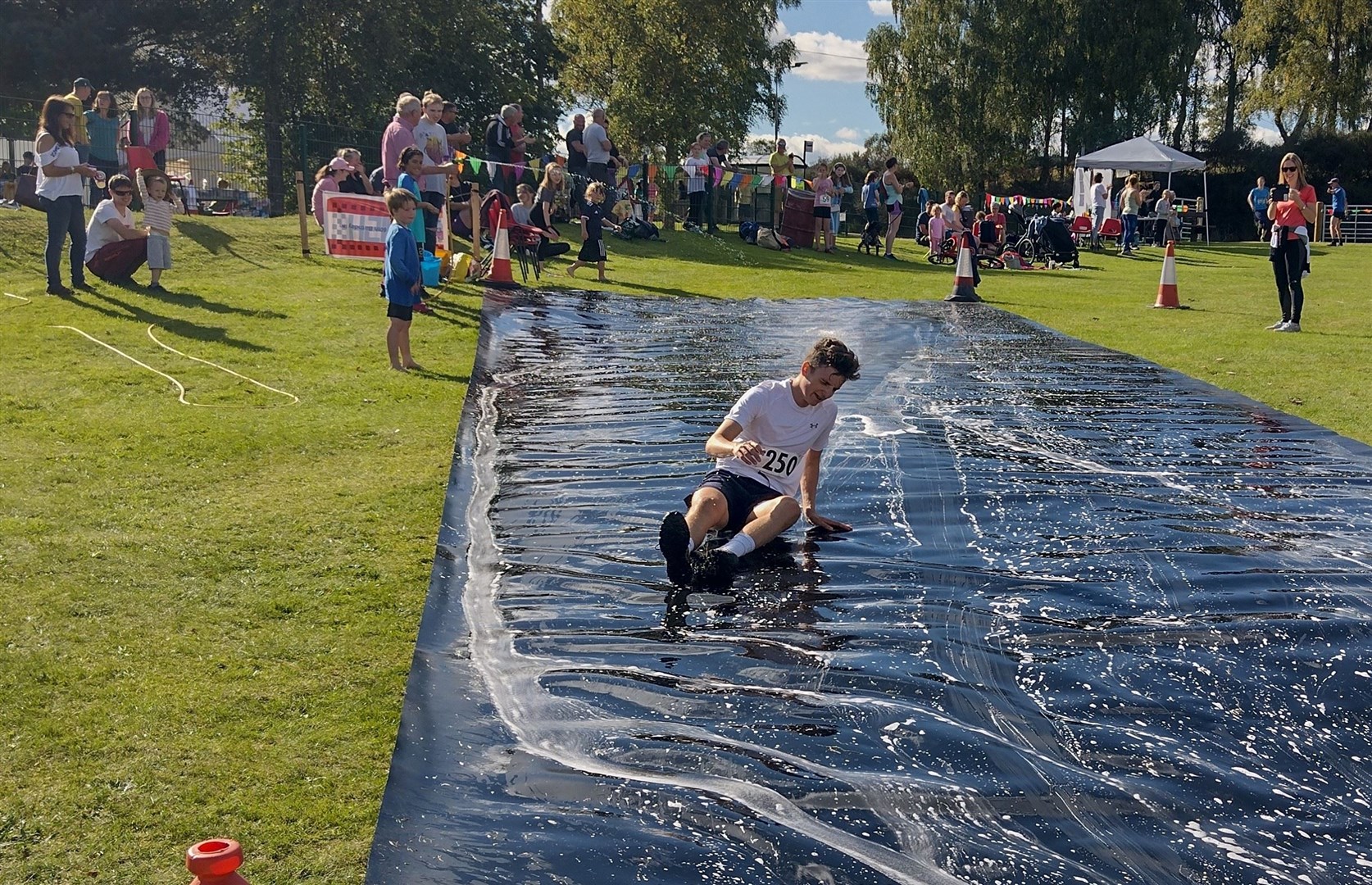 Pavel Nagel slides home after his Suie Hill run