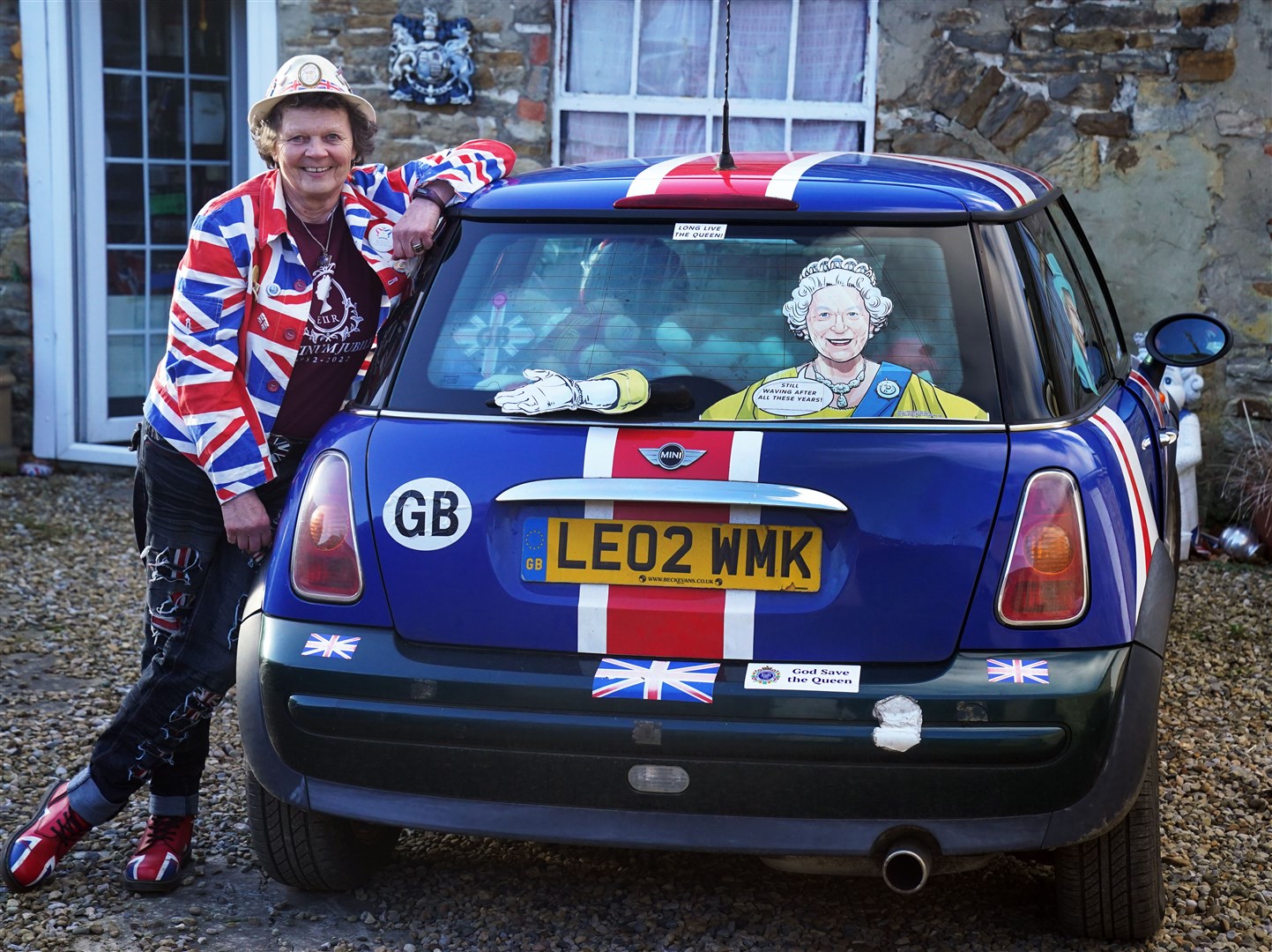 Anita Atkinson, 65, with her royal-themed car (Owen Humphreys/PA)