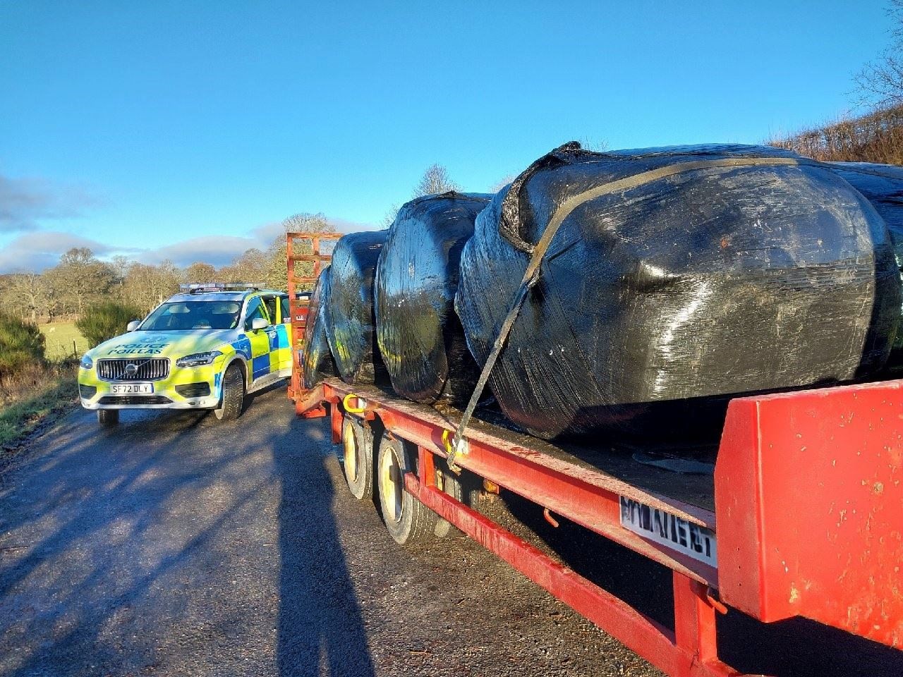Police with one of the lorries it pulled over during its recent Highland campaign. Picture: Police Scotland.