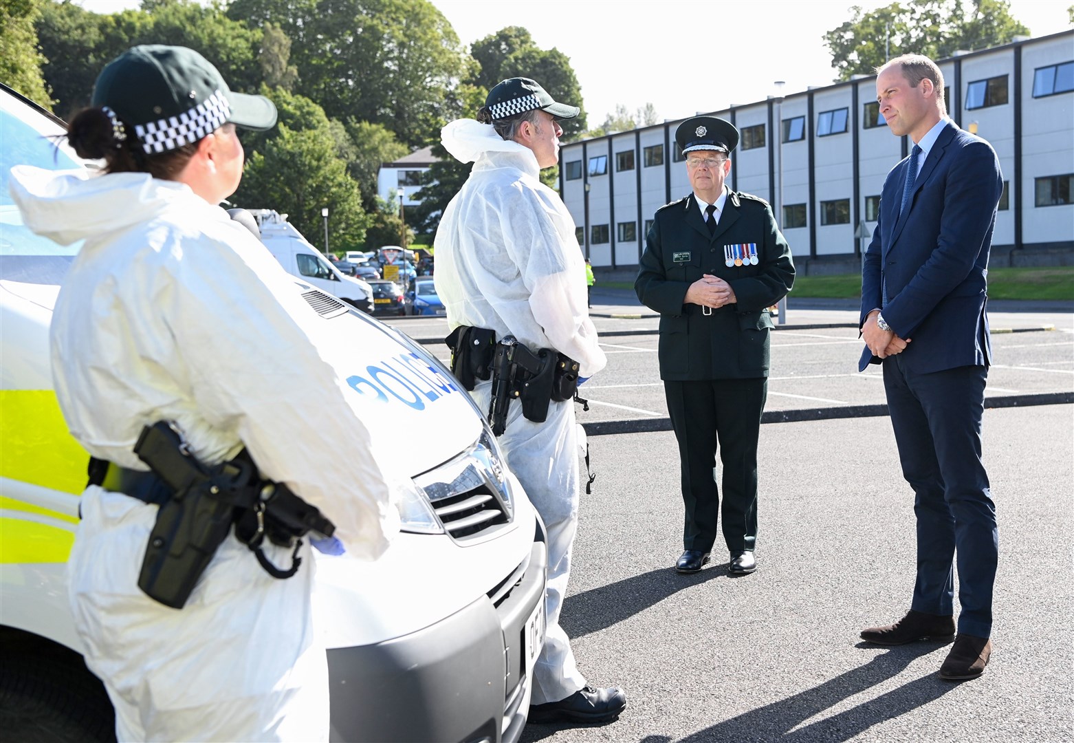 William with Chief Constable Simon Byrne speaking to members of the PSNI Covid-19 response unit (Tom Rooke/PA)