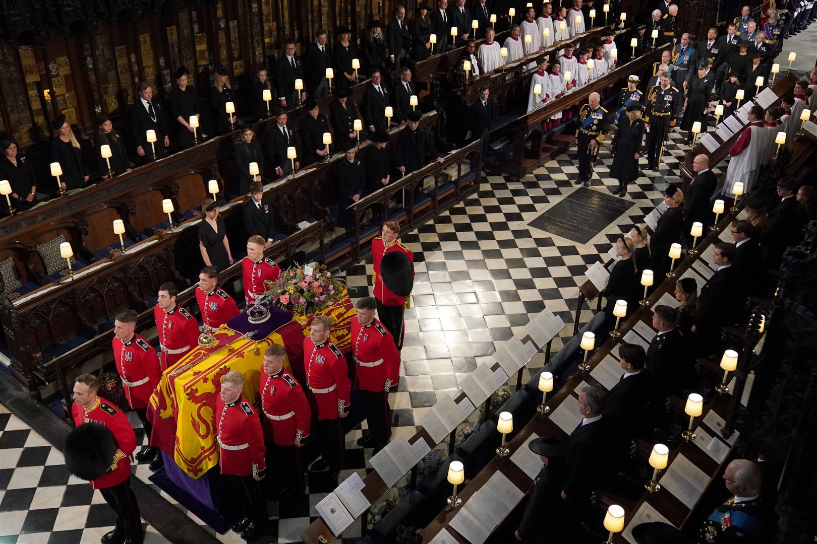 Senior royals, including the new King Charles III, follow the Queen’s coffin as it is carried by the Bearer Party into the Committal Service at St George’s Chapel in Windsor Castle, Berkshire, on Monday September 19 (Victoria Jones/PA)