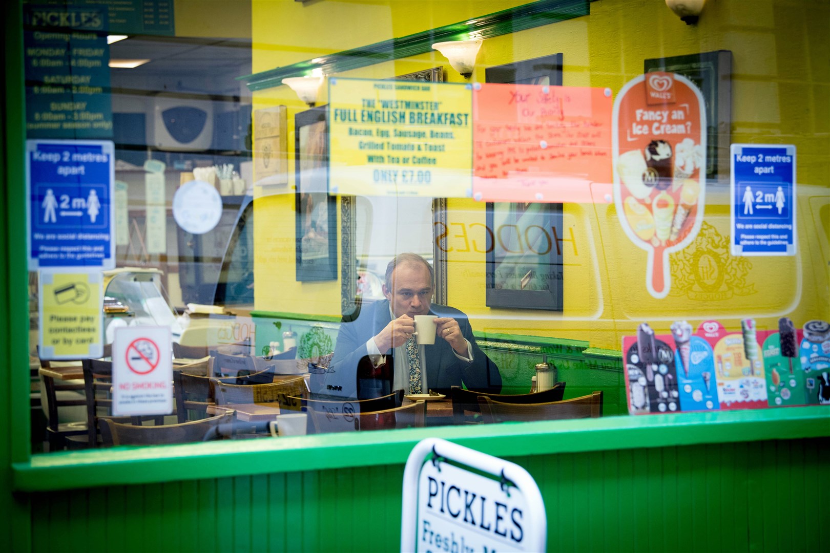 Sir Ed sits in a cafe in Westminster shortly before delivering his speech (Stefan Rousseau/PA)