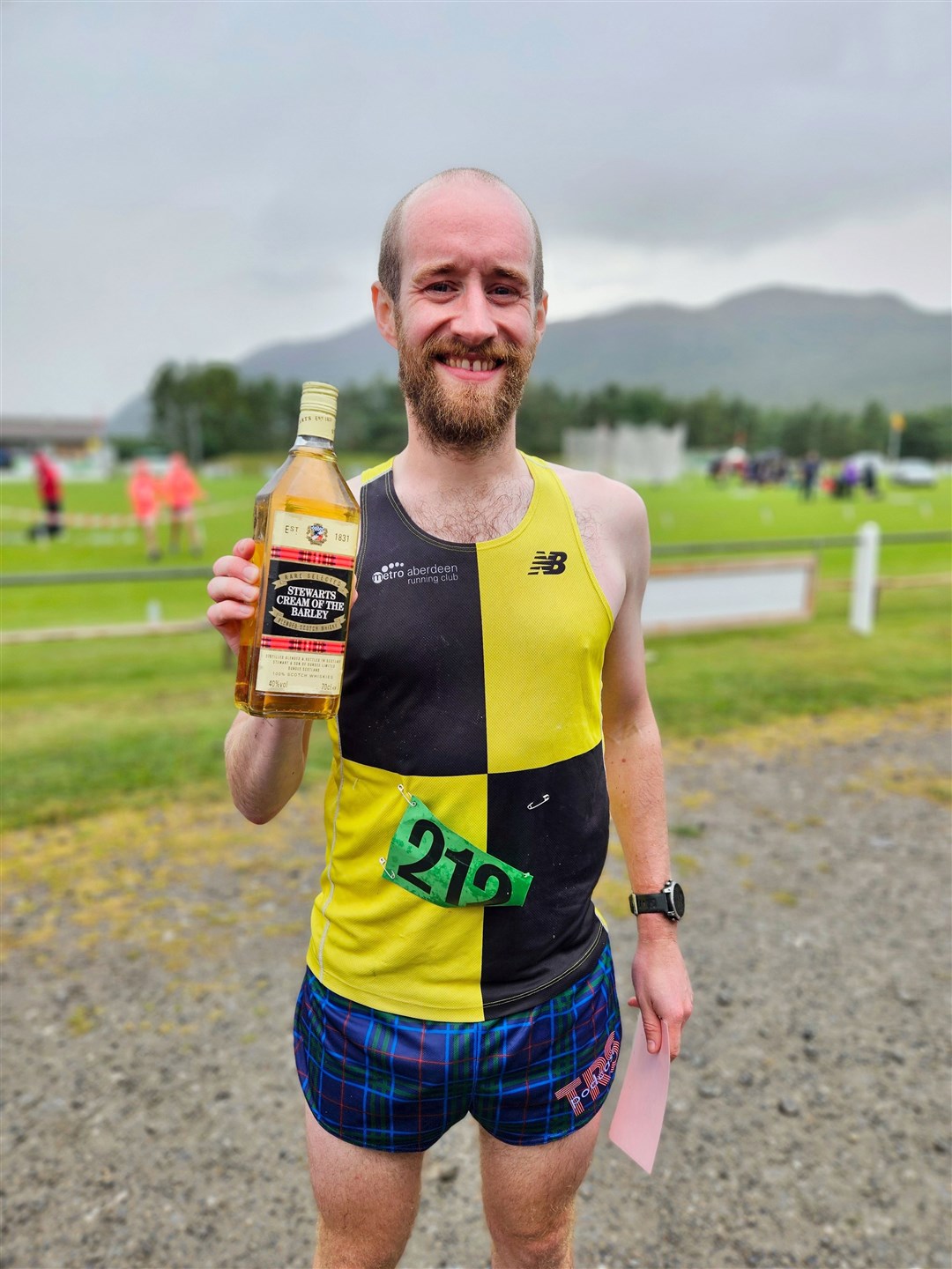 FASTEST FEET, FASTEST FORK! 1500m winner Chris Richardson of Aberdeen also won the haggis-eating race