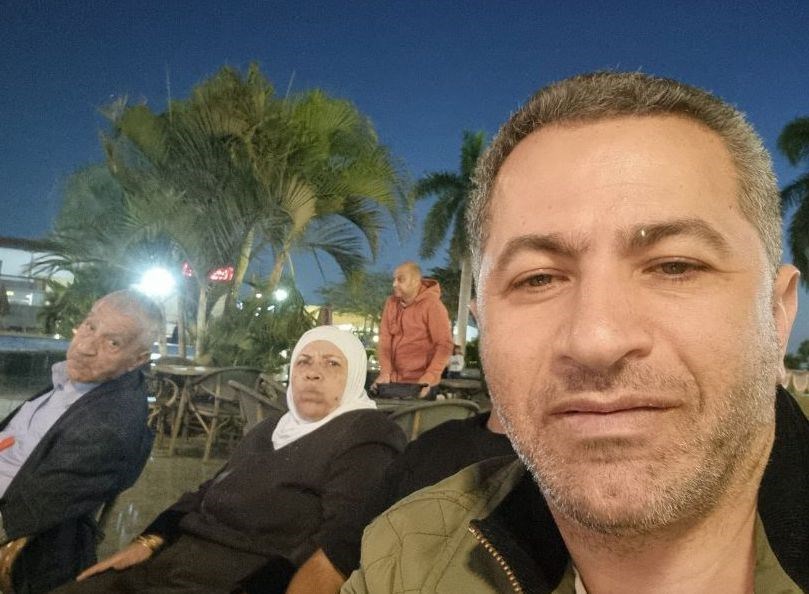 Dr Salim Ghayyda is reunited with his father Nabil (85) and mother Dalal (75) after they were allowed to cross the border from Gaza into Egypt.