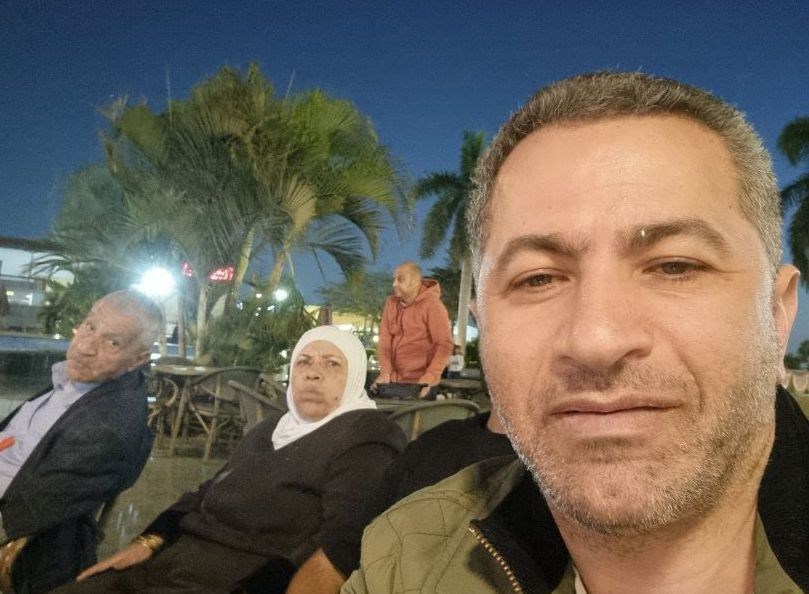 Dr Salim Ghayyda is reunited with his father Nabil (85) and mother Dalal (75) after they were allowed to cross the border from Gaza into Egypt.