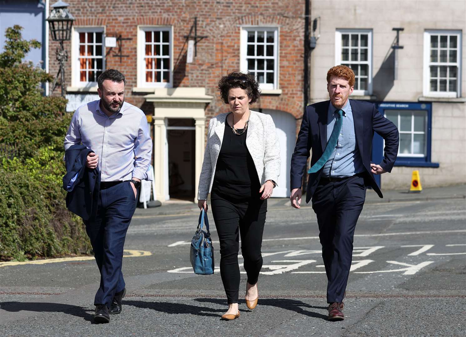 Members of the SDLP, (left to right) Colum Eastwood MP, Claire Hanna MP and Matthew O’Toole MLA arrive at Hillsborough Castle (Liam McBurney/PA)