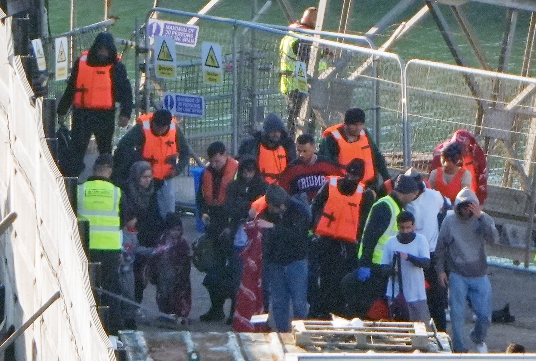 A group of people thought to be migrants have been brought in to Dover, Kent, from a Border Force vessel following a small boat incident in the Channel (Gareth Fuller/PA)
