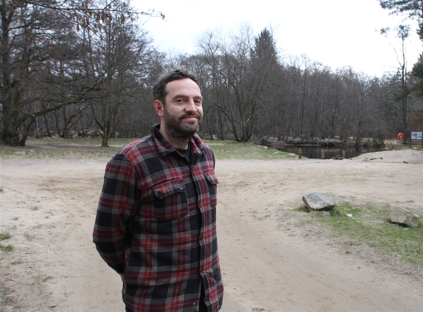 Old Bridge Inn boss Owen Caldwell in front of the site of the beer garden with the River Spey access point to the right at rear.