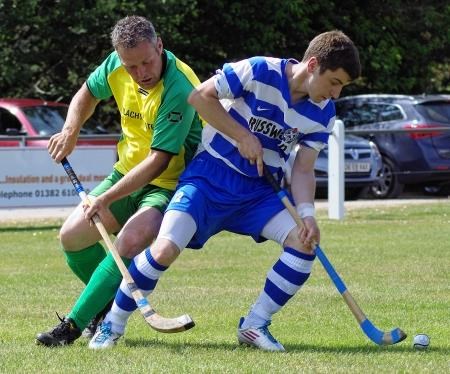 Drew MacDonald in action for Newtonmore.